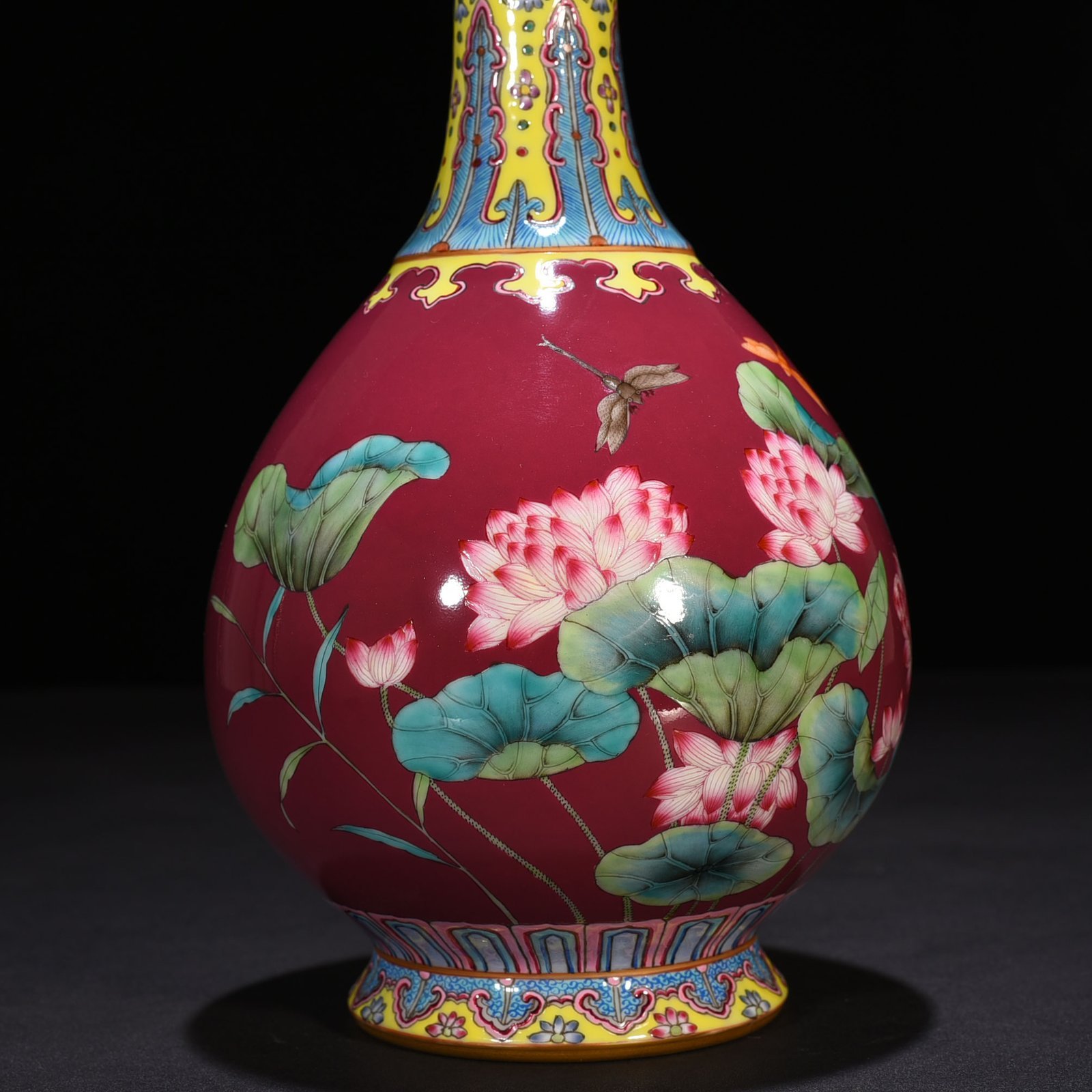 Qing Dynasty Qianlong rouge red ground enamel garlic vase with lotus pattern