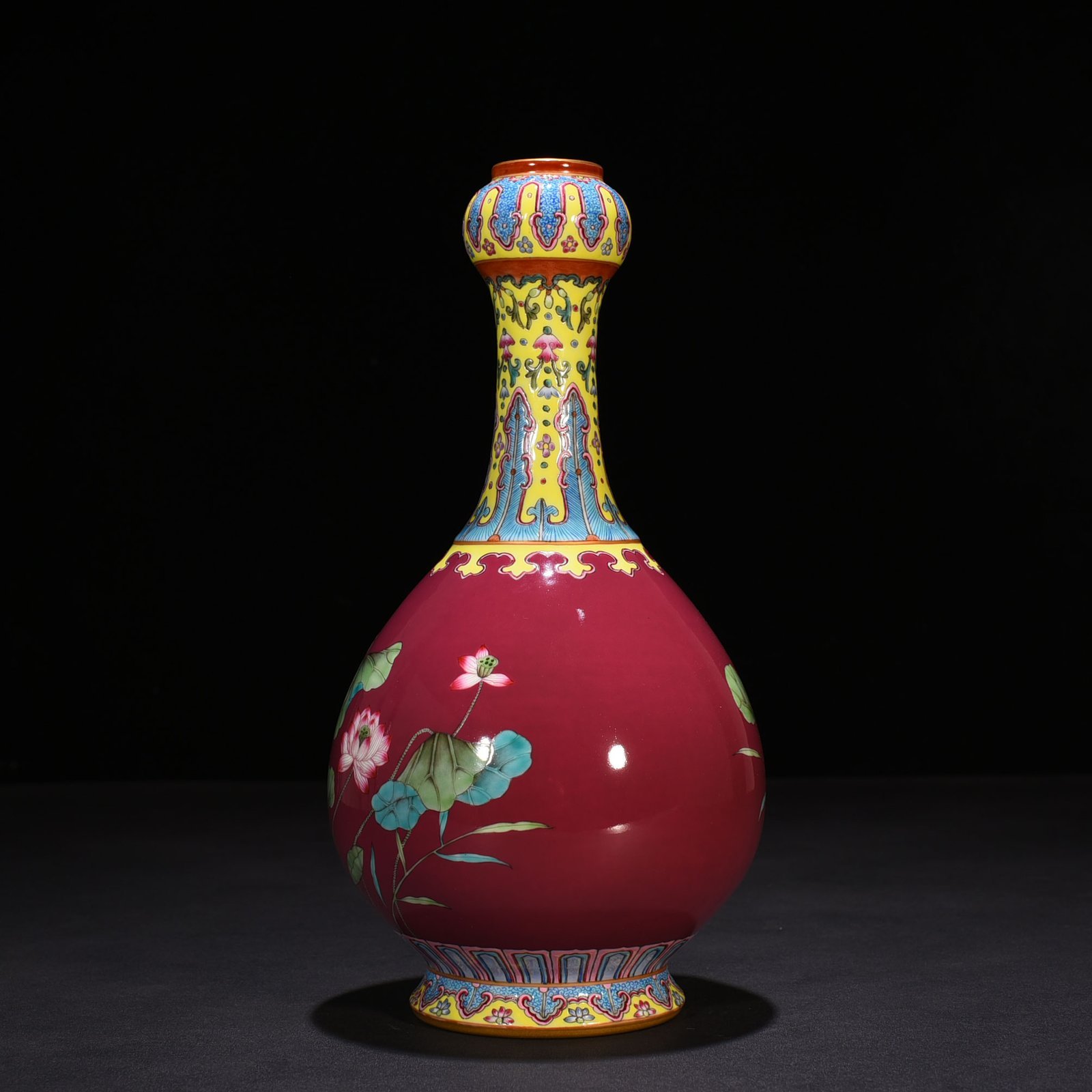 Qing Dynasty Qianlong rouge red ground enamel garlic vase with lotus pattern