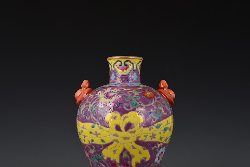 Qing Dynasty Qianlong rouge red ground enamel plum vase with floral