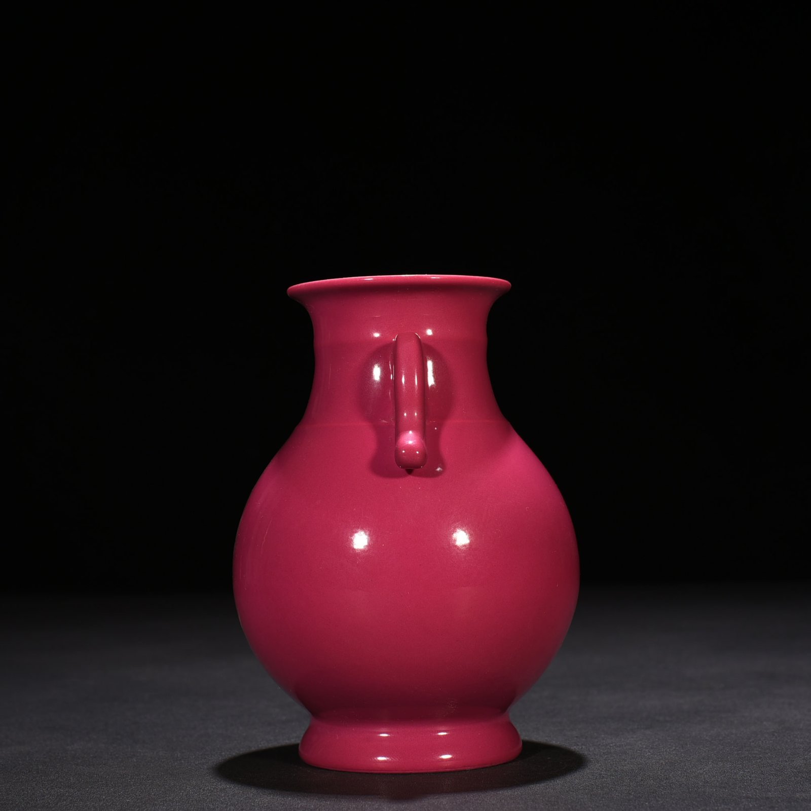 Qing Dynasty Qianlong rouge red glaze double-eared statu