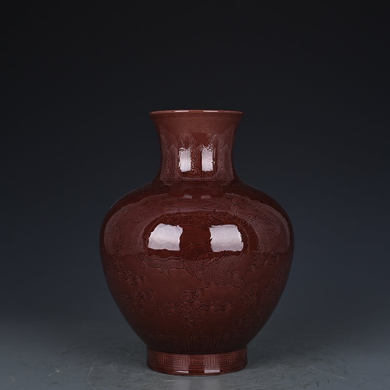 Qing Dynasty Qianlong eggplant skin purple glaze bottle with hidden dragon