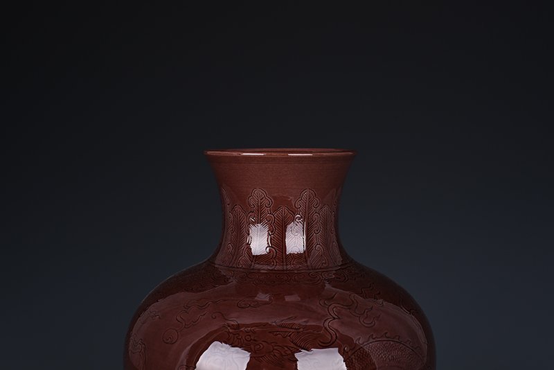 Qing Dynasty Qianlong eggplant skin purple glaze bottle with hidden dragon