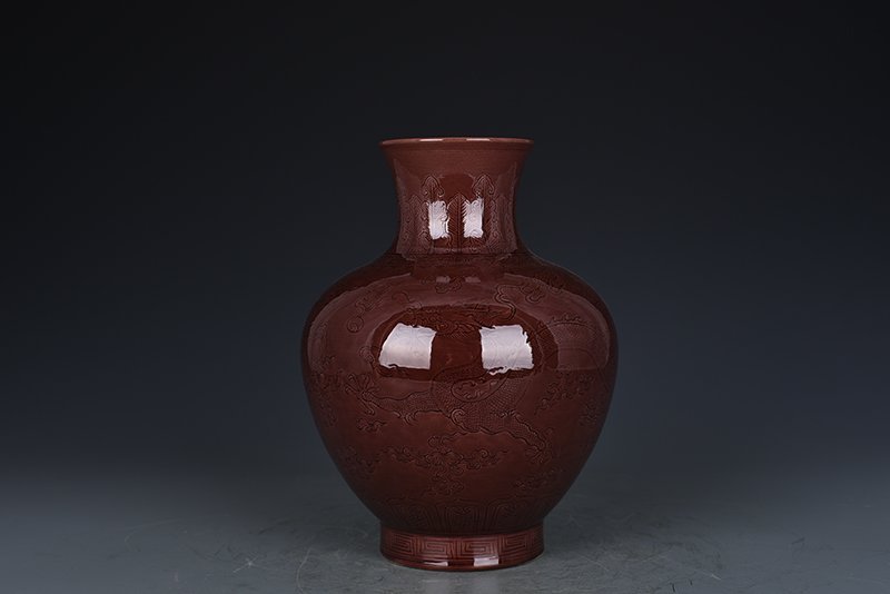 Qing Dynasty Qianlong eggplant skin purple glaze bottle with hidden dragon