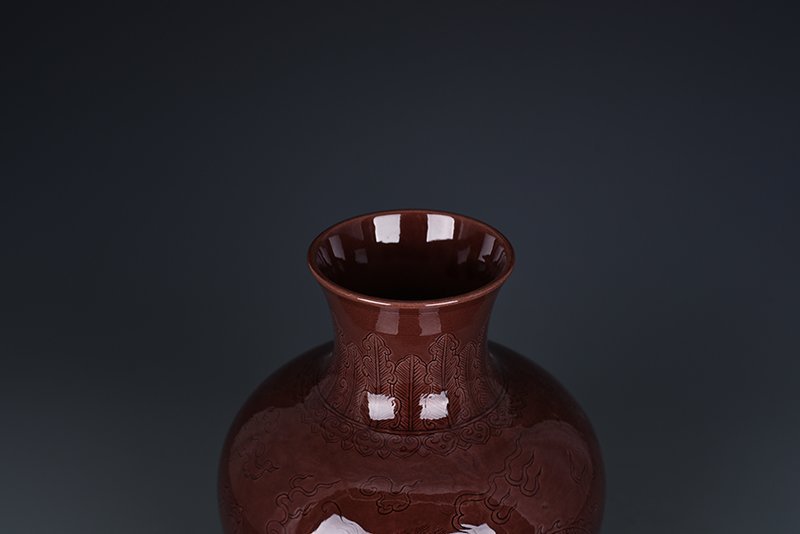 Qing Dynasty Qianlong eggplant skin purple glaze bottle with hidden dragon