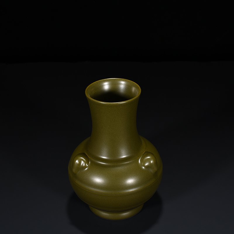 Qing Dynasty Qianlong tea-glazed three-goat statue