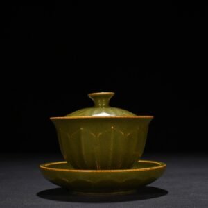 Qing Dynasty Qianlong tea powder glaze engraved banana leaf pattern covered bowl