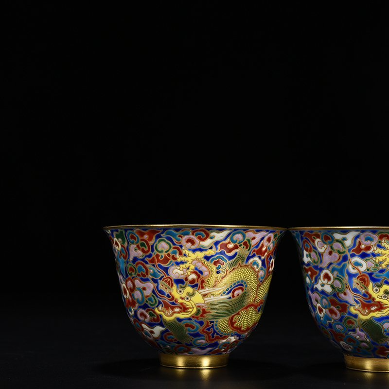 Qing Dynasty Qianlong blue ground enamel cup with gold cloud and dragon pattern