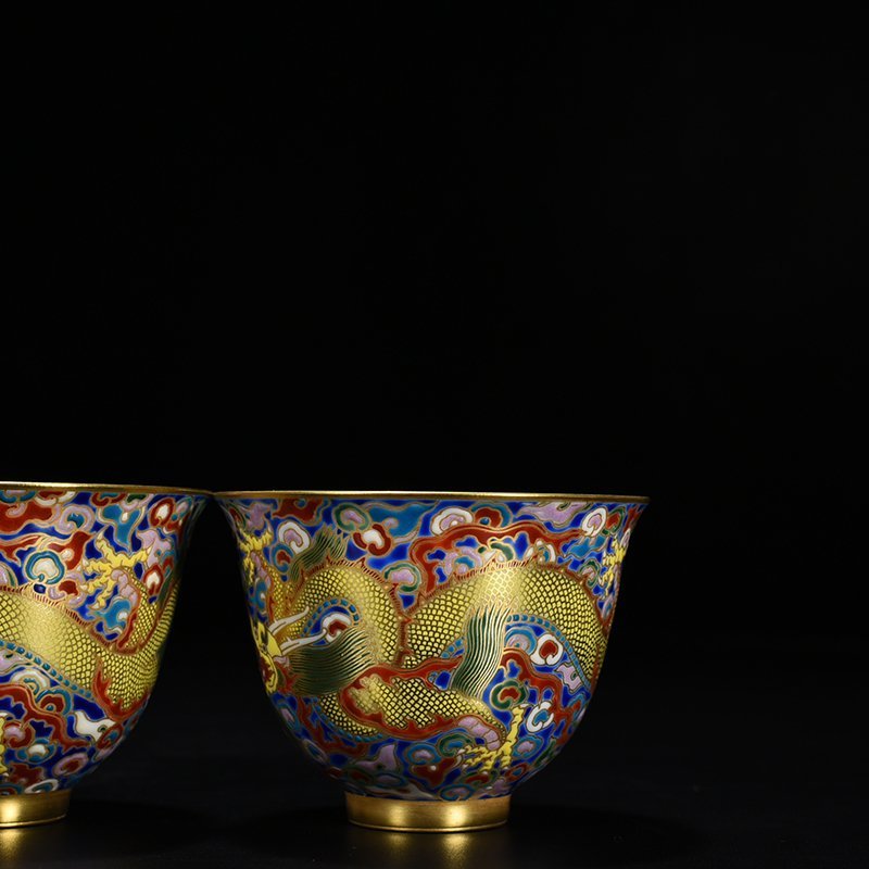 Qing Dynasty Qianlong blue ground enamel cup with gold cloud and dragon pattern