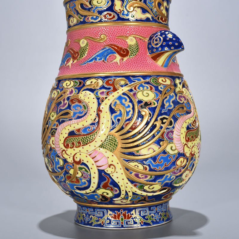 Qing Dynasty Qianlong blue ground enamel color painted gold carved phoenix pattern double-eared statue