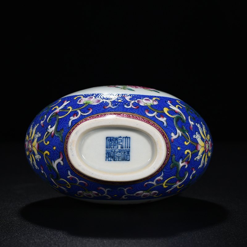 Qing Dynasty Qianlong blue ground rolling grass and insect pattern flat