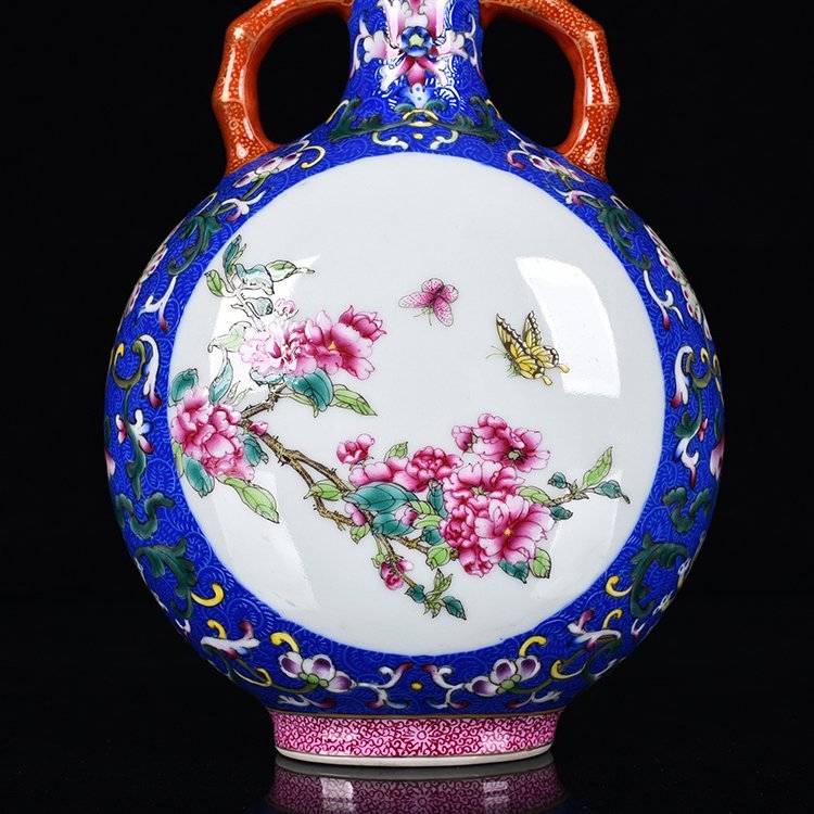 Qing Dynasty Qianlong blue ground butterfly love flower pattern holding the moon flat vase