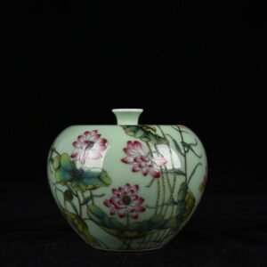 Qing Dynasty Qianlong bean green glaze pastel lotus pattern apple statue
