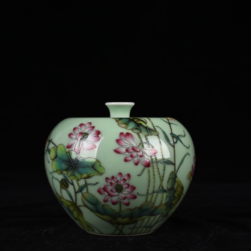 Qing Dynasty Qianlong bean green glaze pastel lotus pattern apple statue