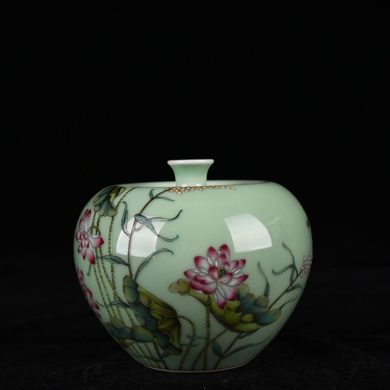 Qing Dynasty Qianlong bean green glaze pastel lotus pattern apple statue
