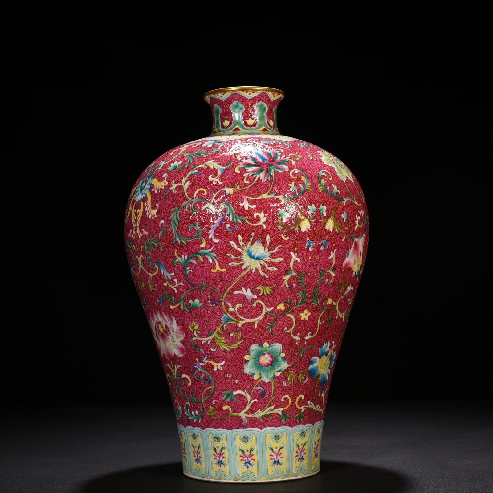 Qing Dynasty Qianlong rolling road carmine red ground pastel flower pattern plum vase