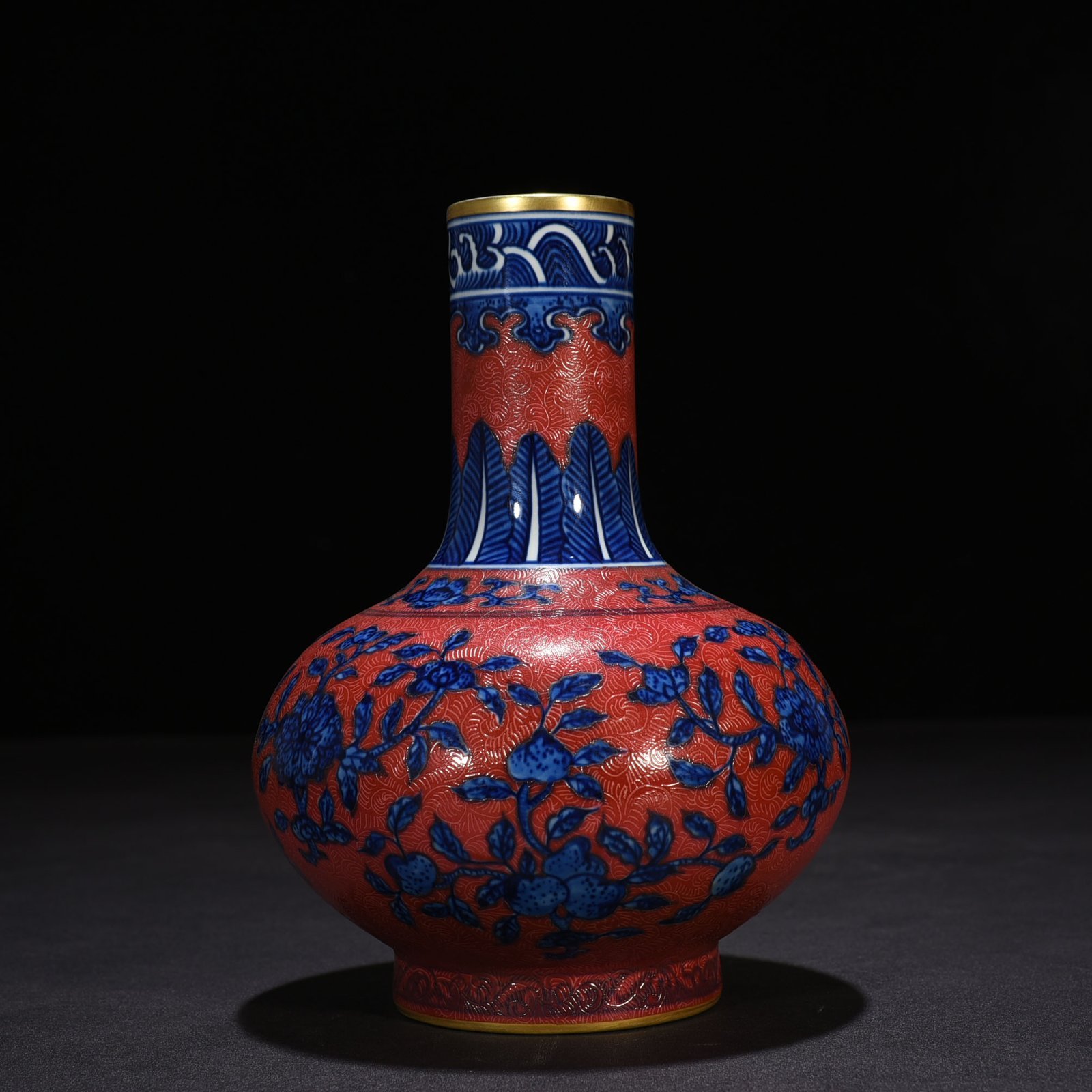 Qing Dynasty Qianlong rolled rouge ground blue and white straight-neck vase