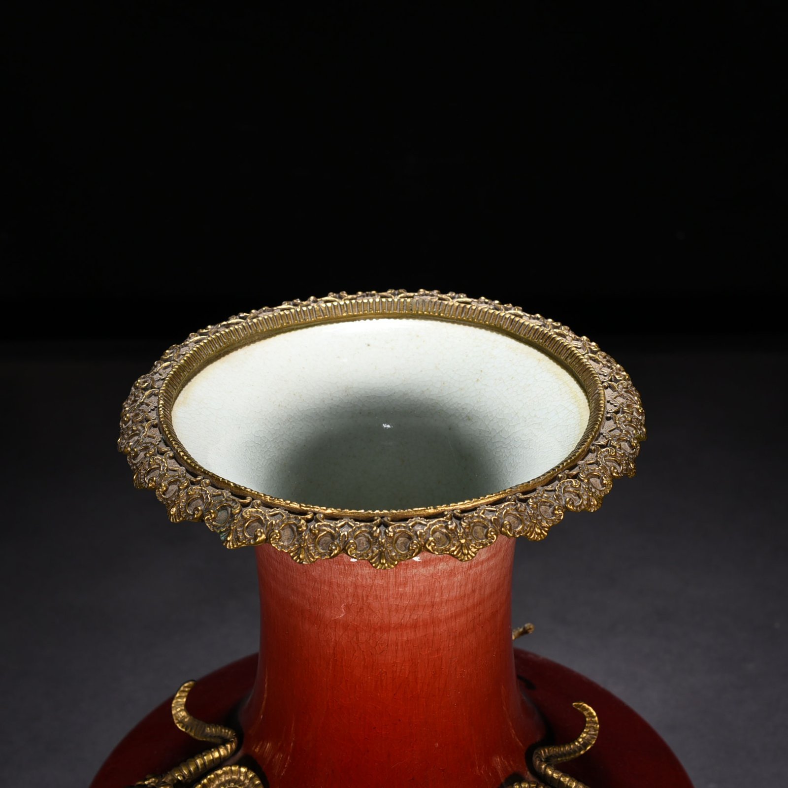 Qing Dynasty Qianlong Lang Kiln red glaze inlaid gilt Sanyang Kaitai flat belly vase