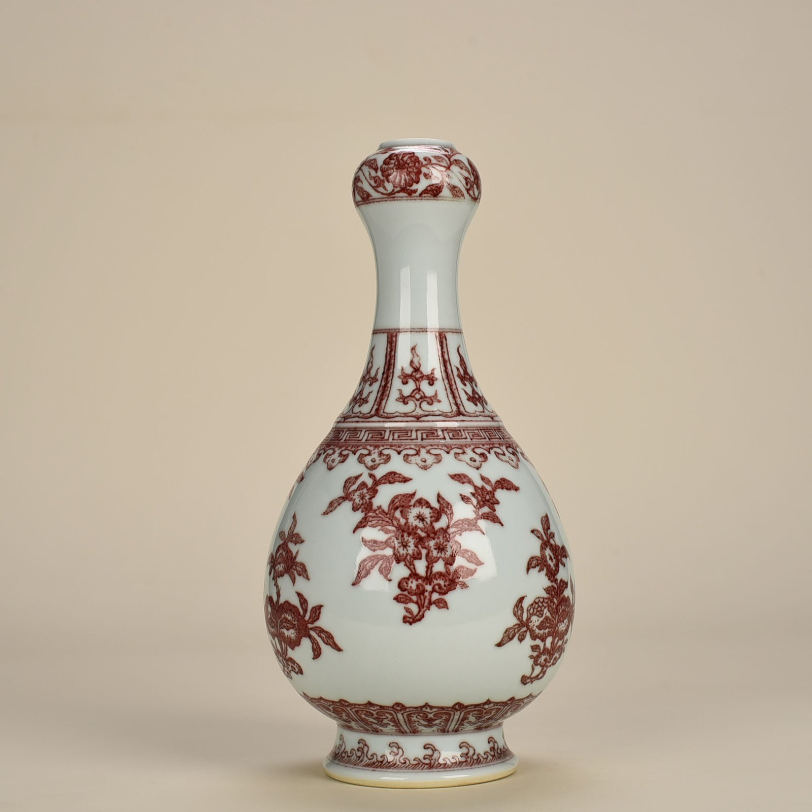 Qing Dynasty Qianlong underglaze red garlic vase