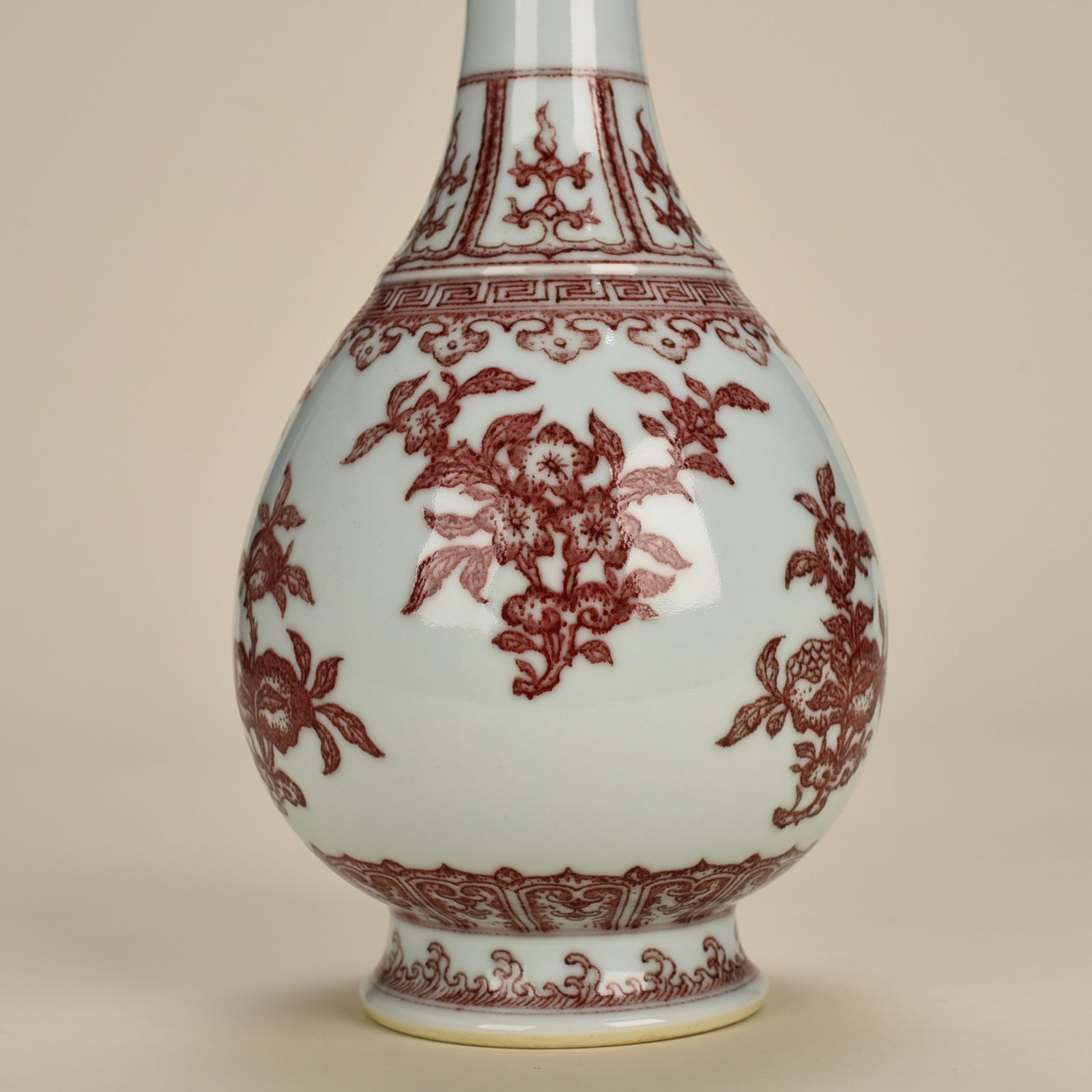 Qing Dynasty Qianlong underglaze red garlic vase