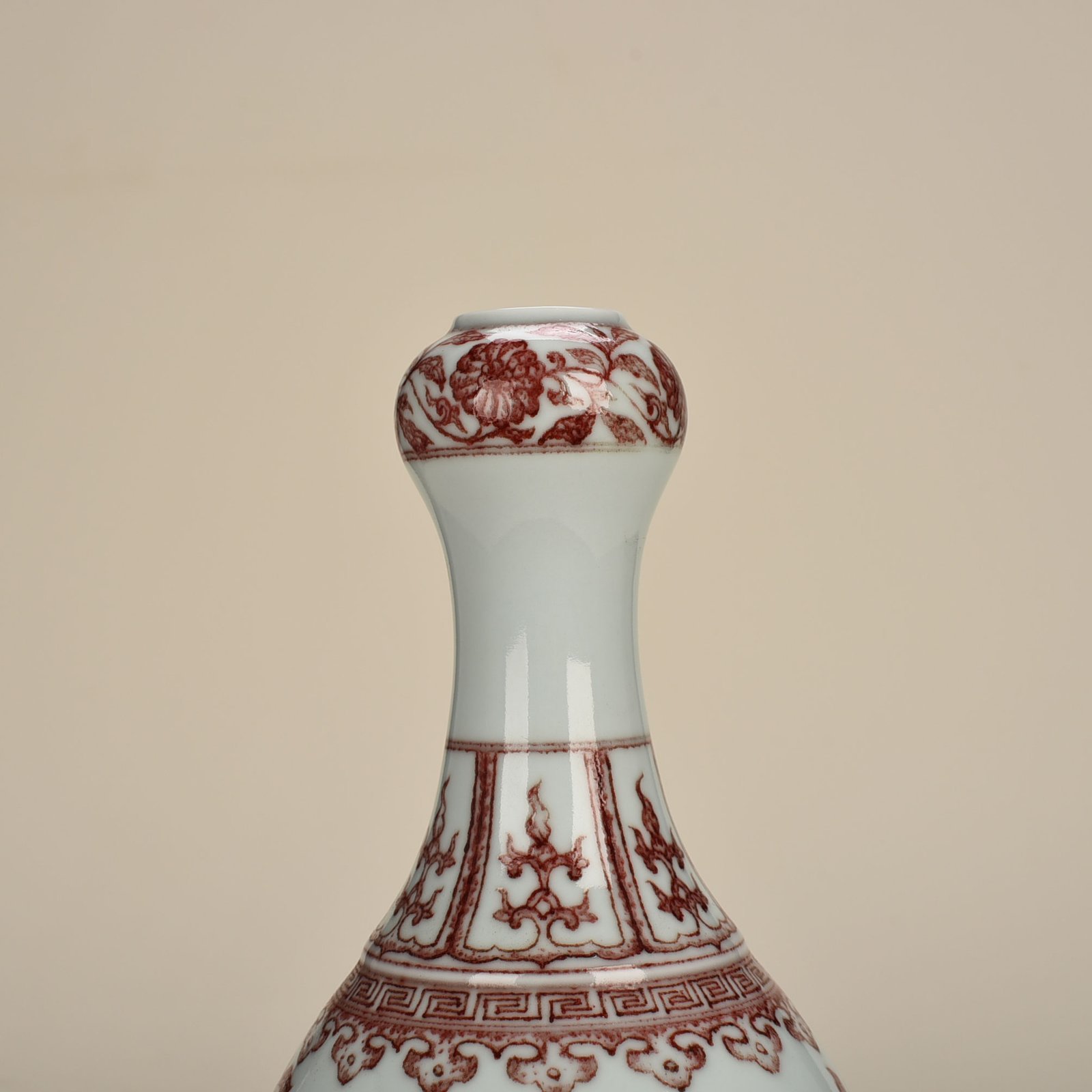 Qing Dynasty Qianlong underglaze red garlic vase