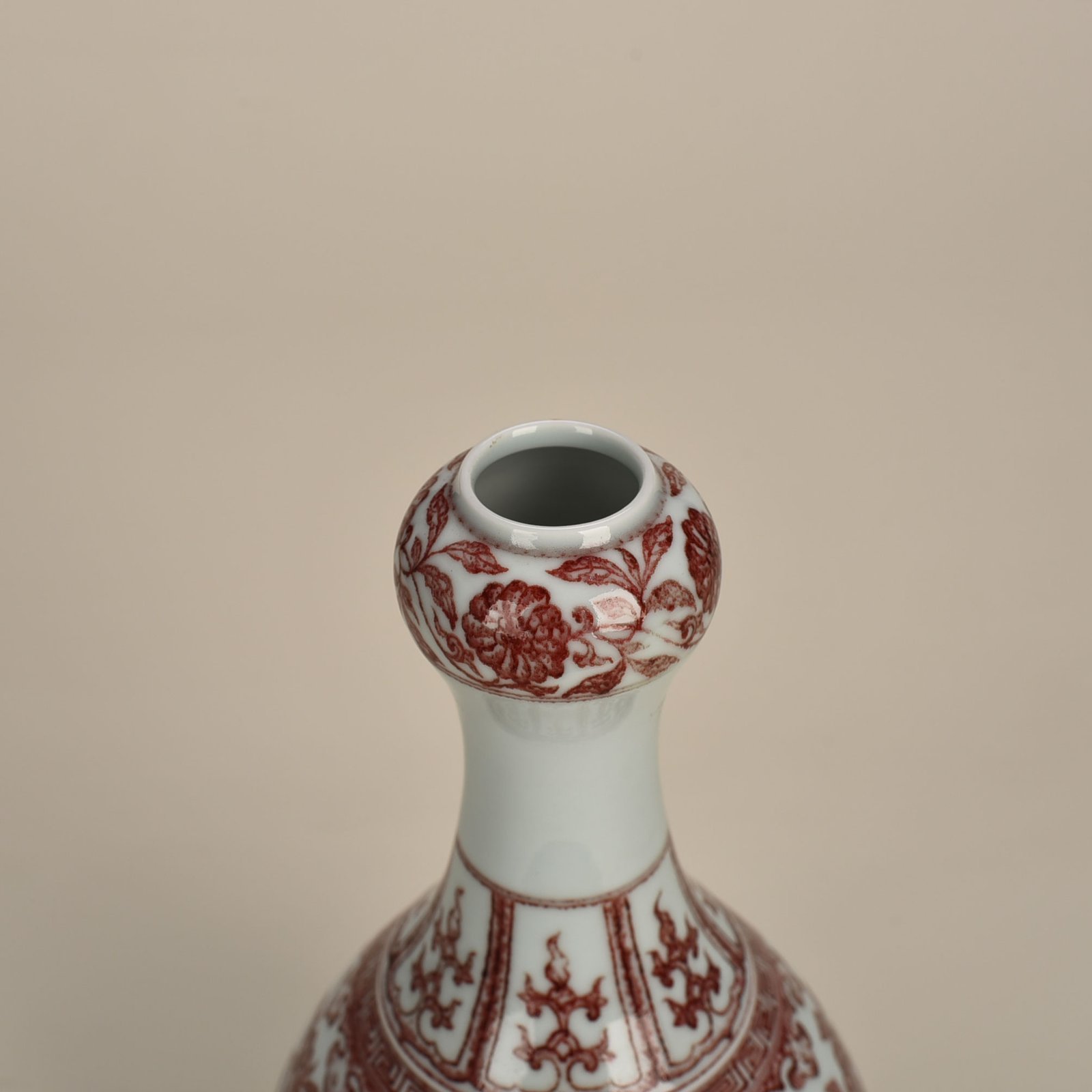 Qing Dynasty Qianlong underglaze red garlic vase