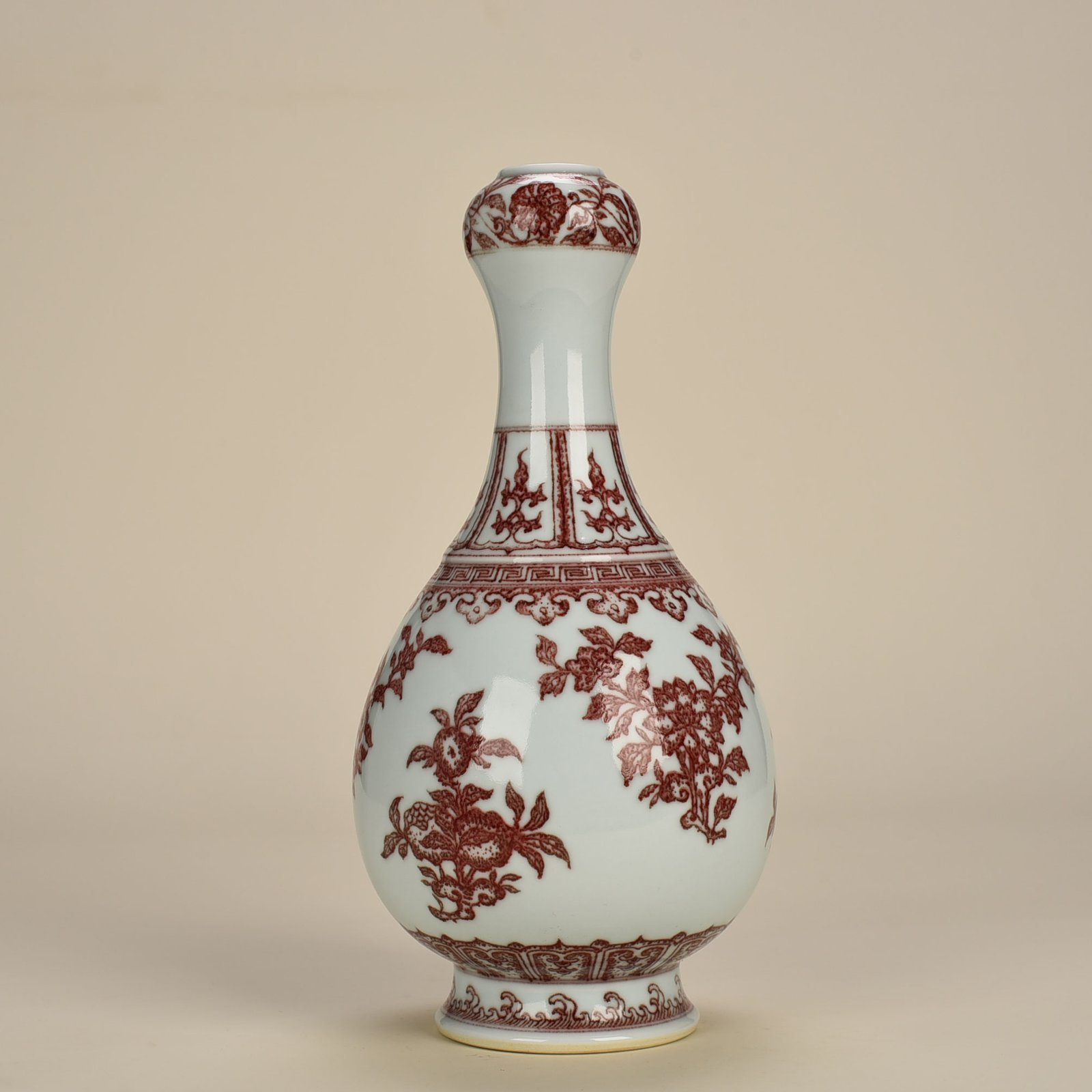 Qing Dynasty Qianlong underglaze red garlic vase