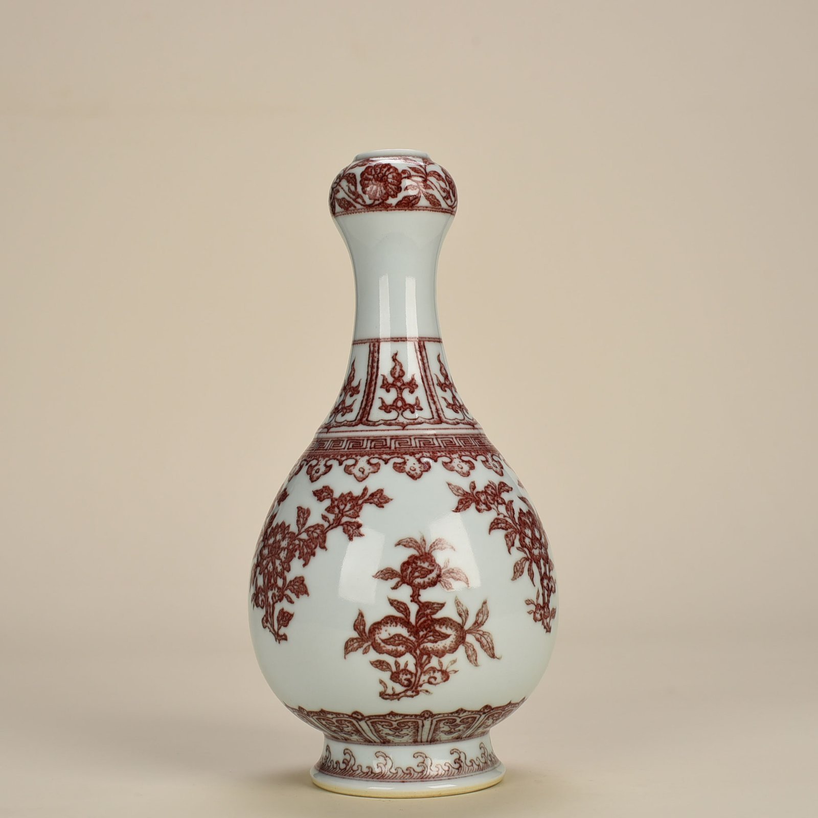 Qing Dynasty Qianlong underglaze red garlic vase