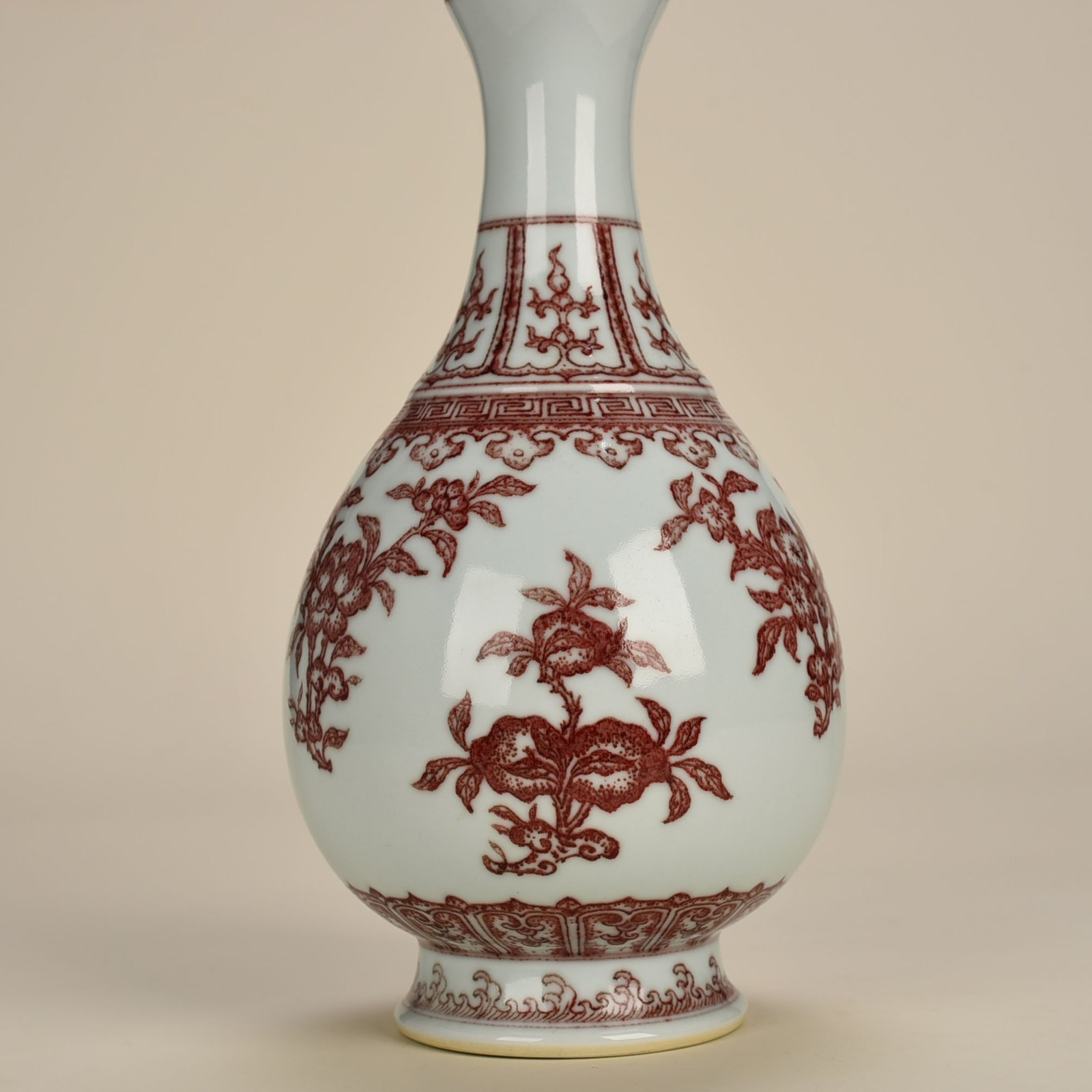 Qing Dynasty Qianlong underglaze red garlic vase