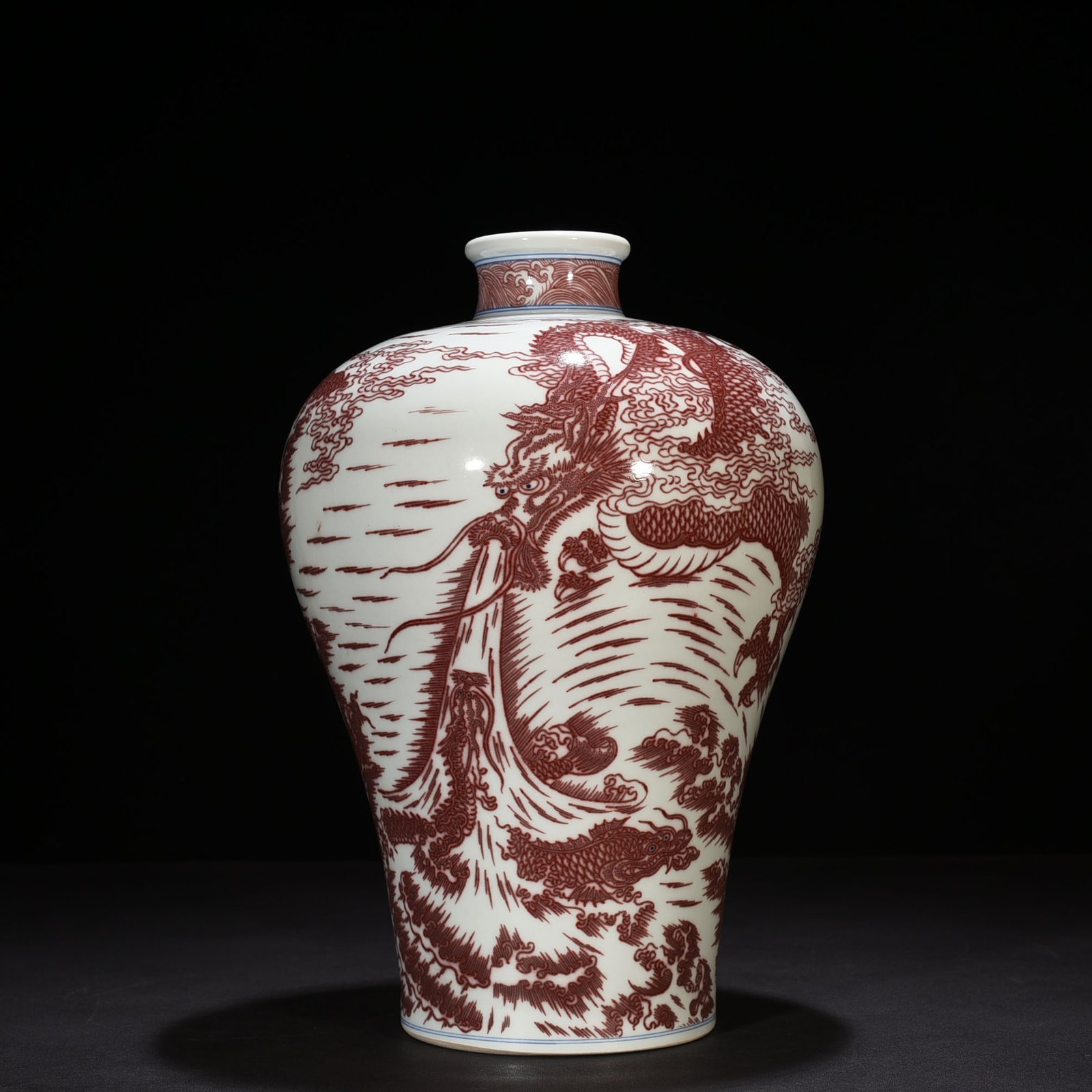 Qing Dynasty Qianlong underglaze red Canglong Jiaozi plum vase