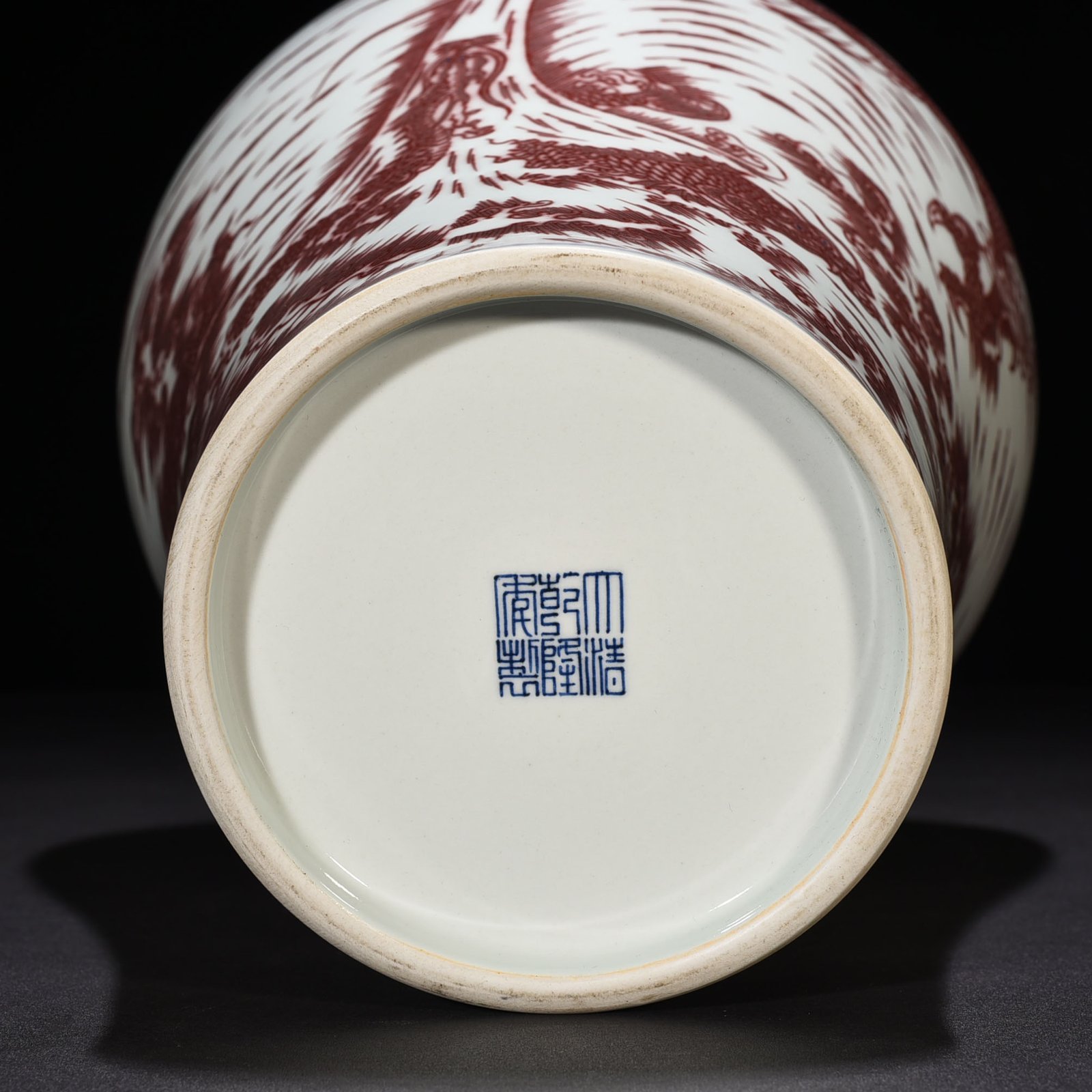 Qing Dynasty Qianlong underglaze red Canglong Jiaozi plum vase