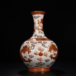 Qing Dynasty Qianlong carved rolled sea alum red vase