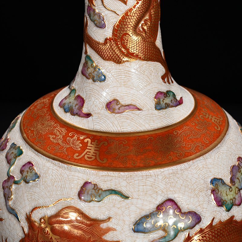 Qing Dynasty Qianlong carved rolled sea alum red vase