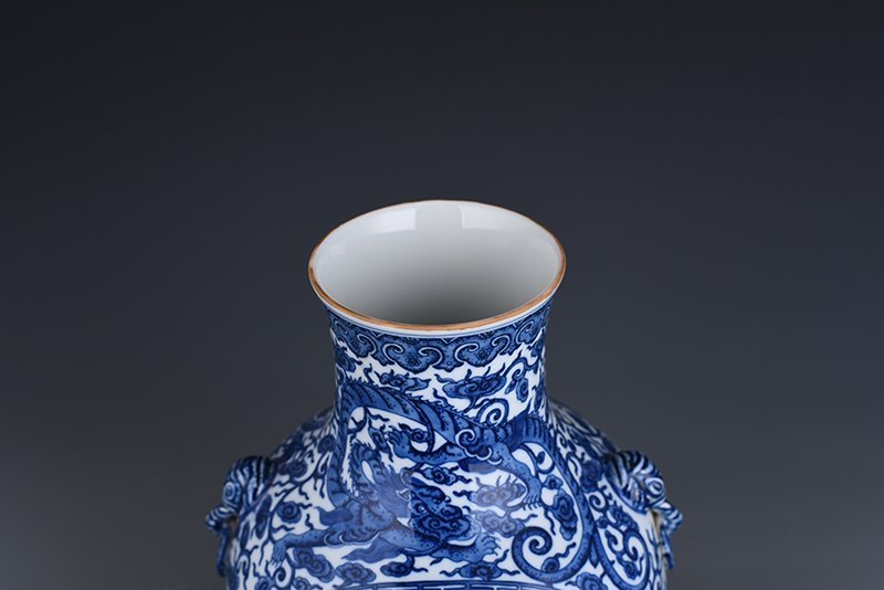 Qing Dynasty Qianlong blue and white blooming pastel pine and crane longevity pattern ear-shaped vase