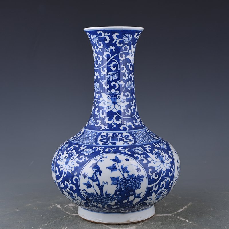 Qing Dynasty Qianlong blue and white flower and bird vase