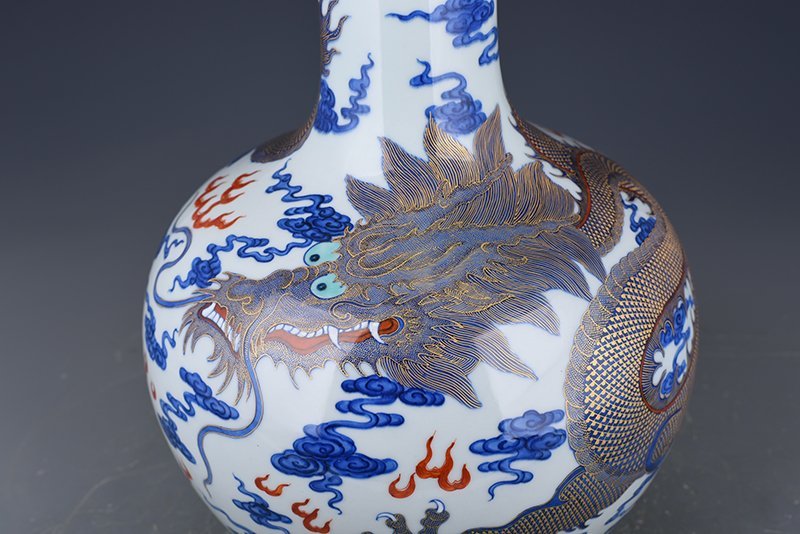Qing Dynasty Qianlong blue and white celestial sphere vase with gold cloud and dragon