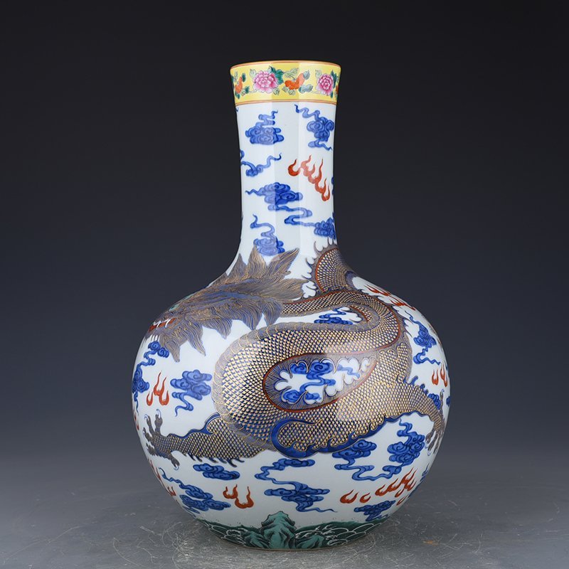Qing Dynasty Qianlong blue and white celestial sphere vase with gold cloud and dragon