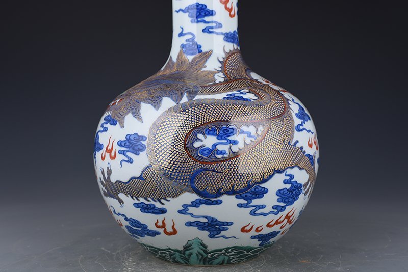 Qing Dynasty Qianlong blue and white celestial sphere vase with gold cloud and dragon