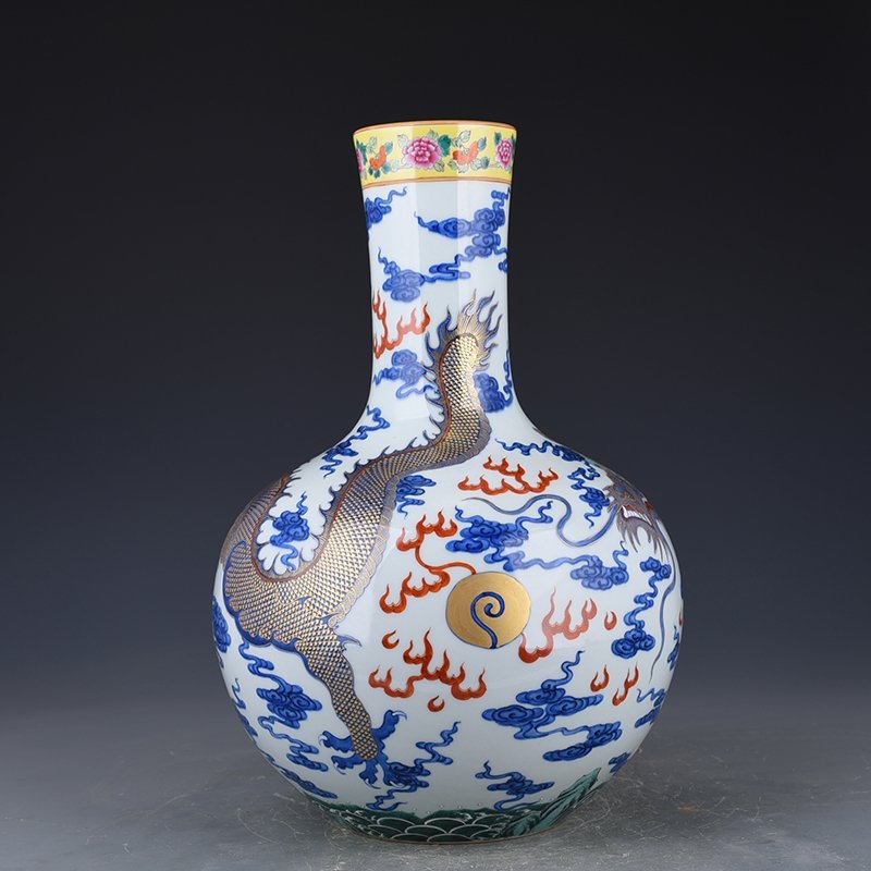 Qing Dynasty Qianlong blue and white celestial sphere vase with gold cloud and dragon