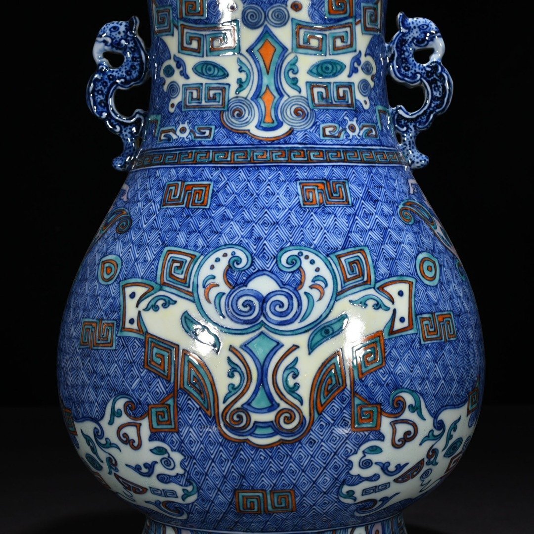 Qing Dynasty Qianlong blue and white Dou Cai Taotie pattern double-eared statue