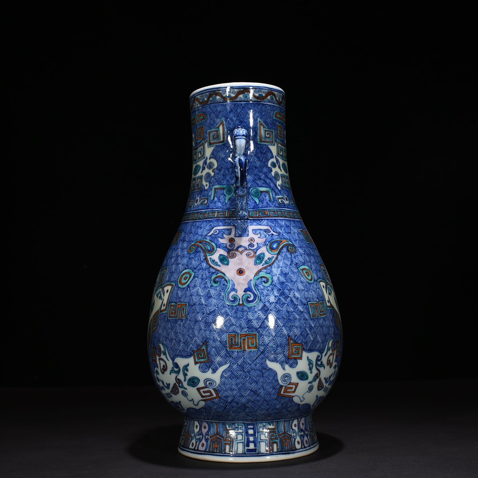 Qing Dynasty Qianlong blue and white Dou Cai Taotie pattern double-eared statue