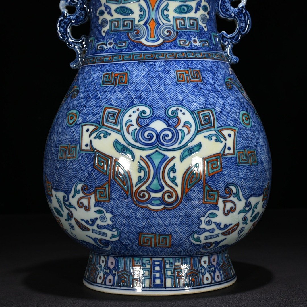 Qing Dynasty Qianlong blue and white Dou Cai Taotie pattern double-eared statue