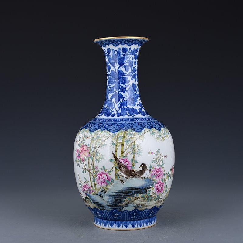 Qing Dynasty Qianlong blue and white melon dish and pastel flower and bird vase