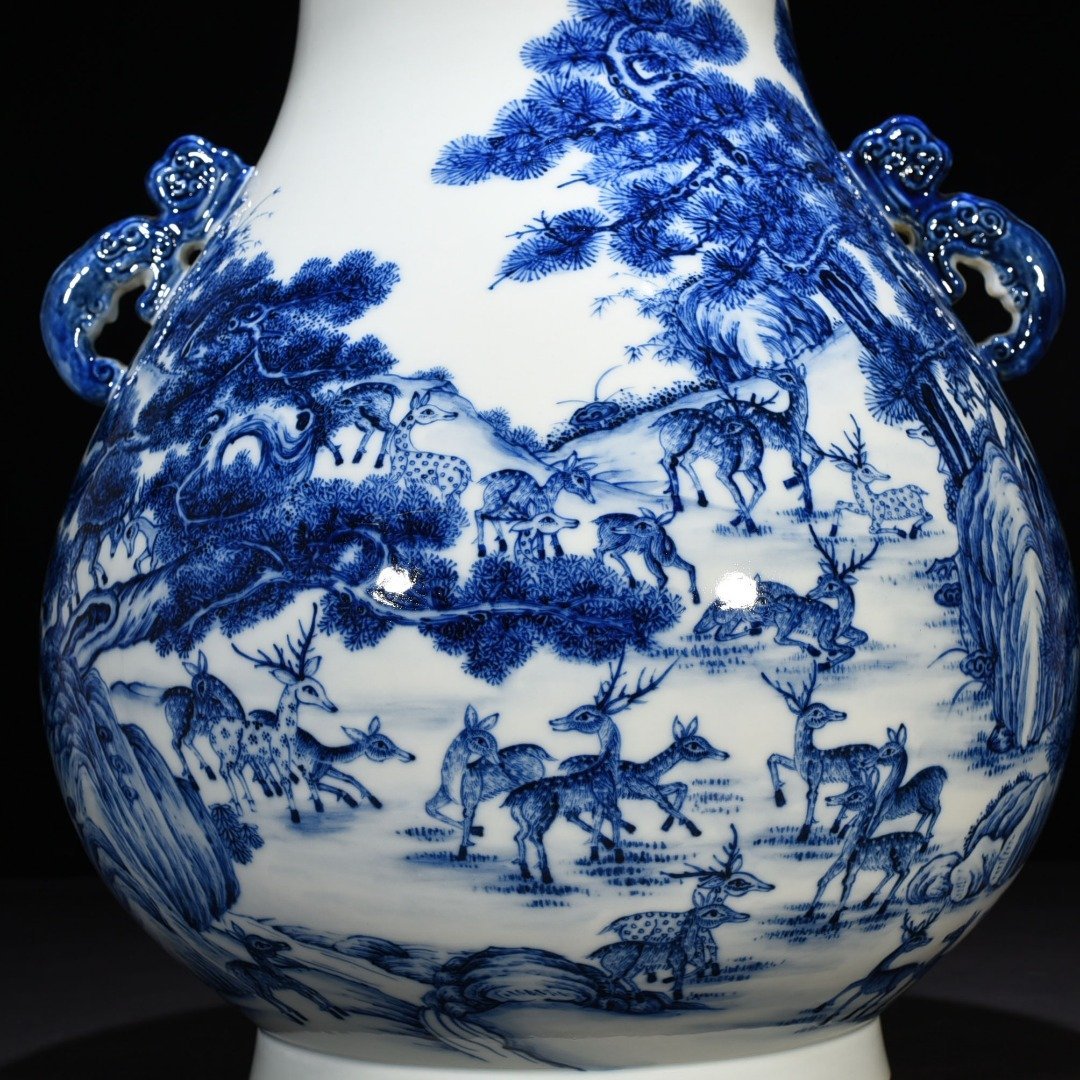 Qing Dynasty Qianlong blue and white hundred deer statue