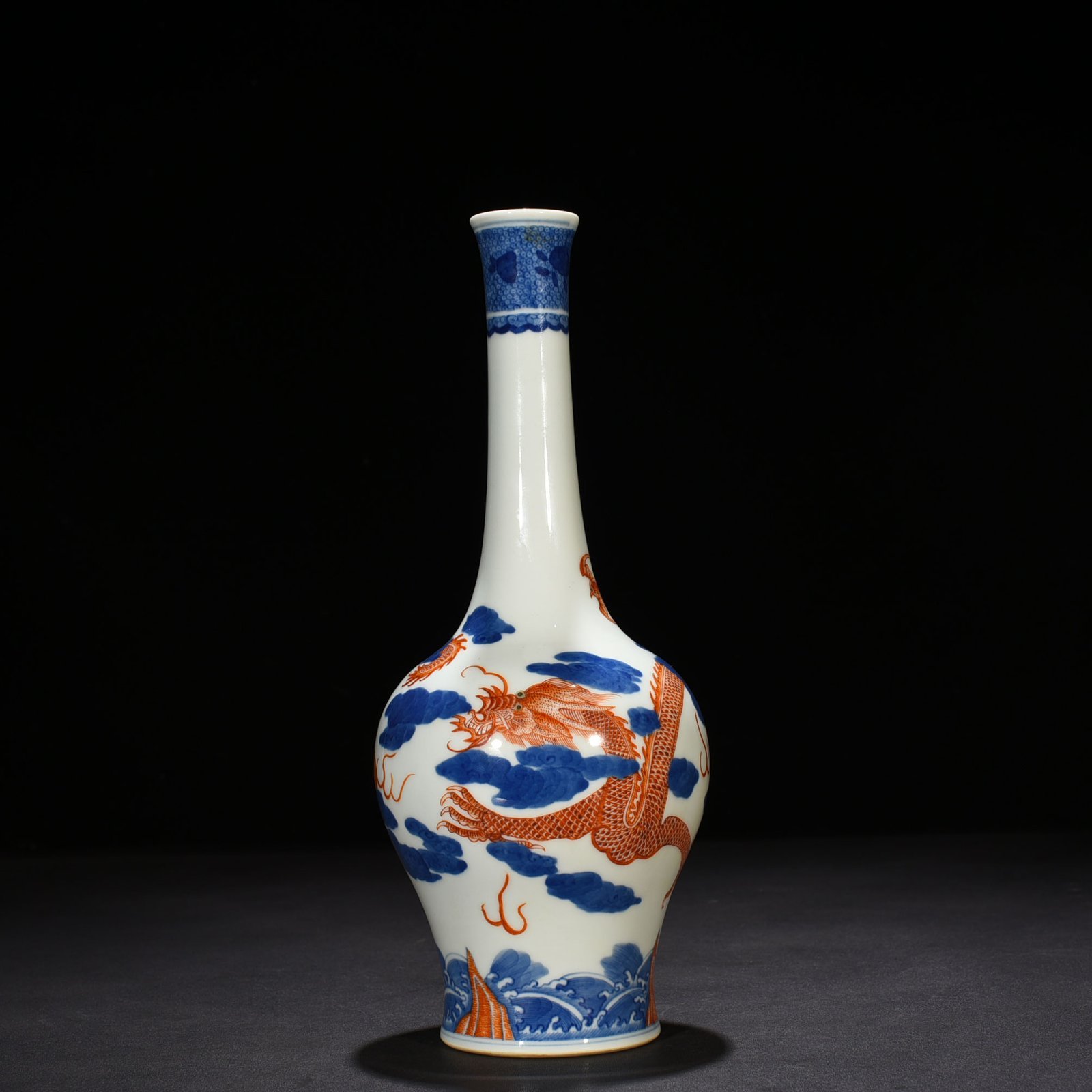 Qing Dynasty Qianlong blue and white alum red cloud and dragon pattern flask