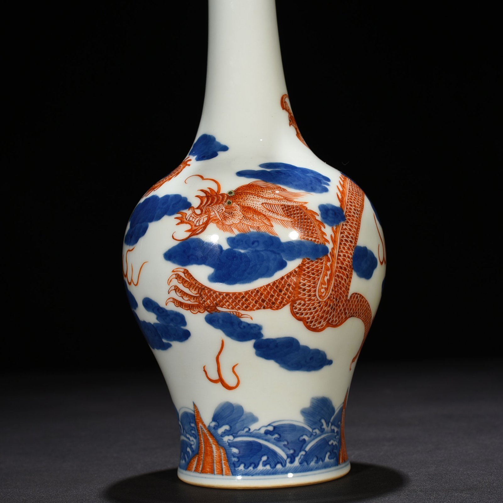 Qing Dynasty Qianlong blue and white alum red cloud and dragon pattern flask