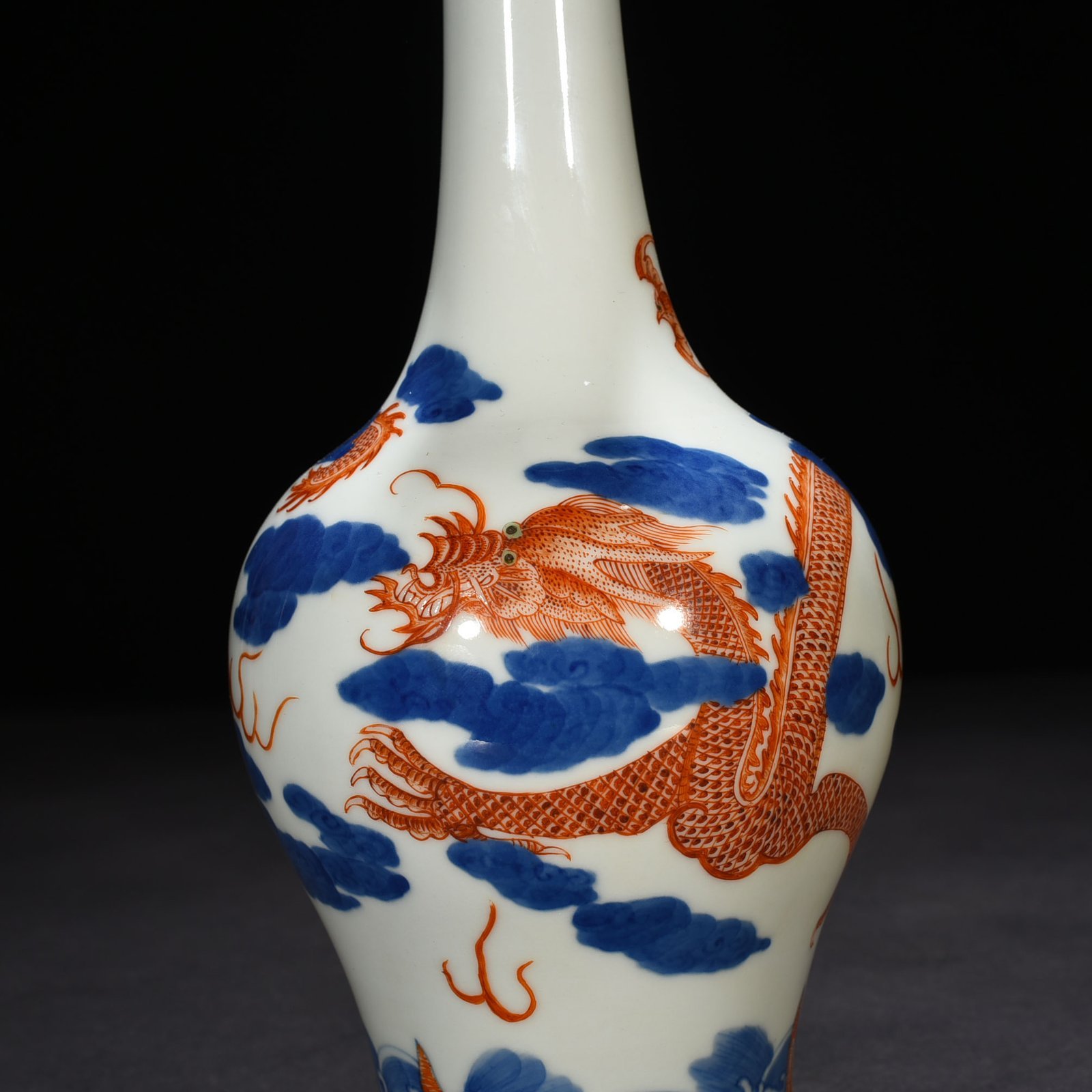 Qing Dynasty Qianlong blue and white alum red cloud and dragon pattern flask