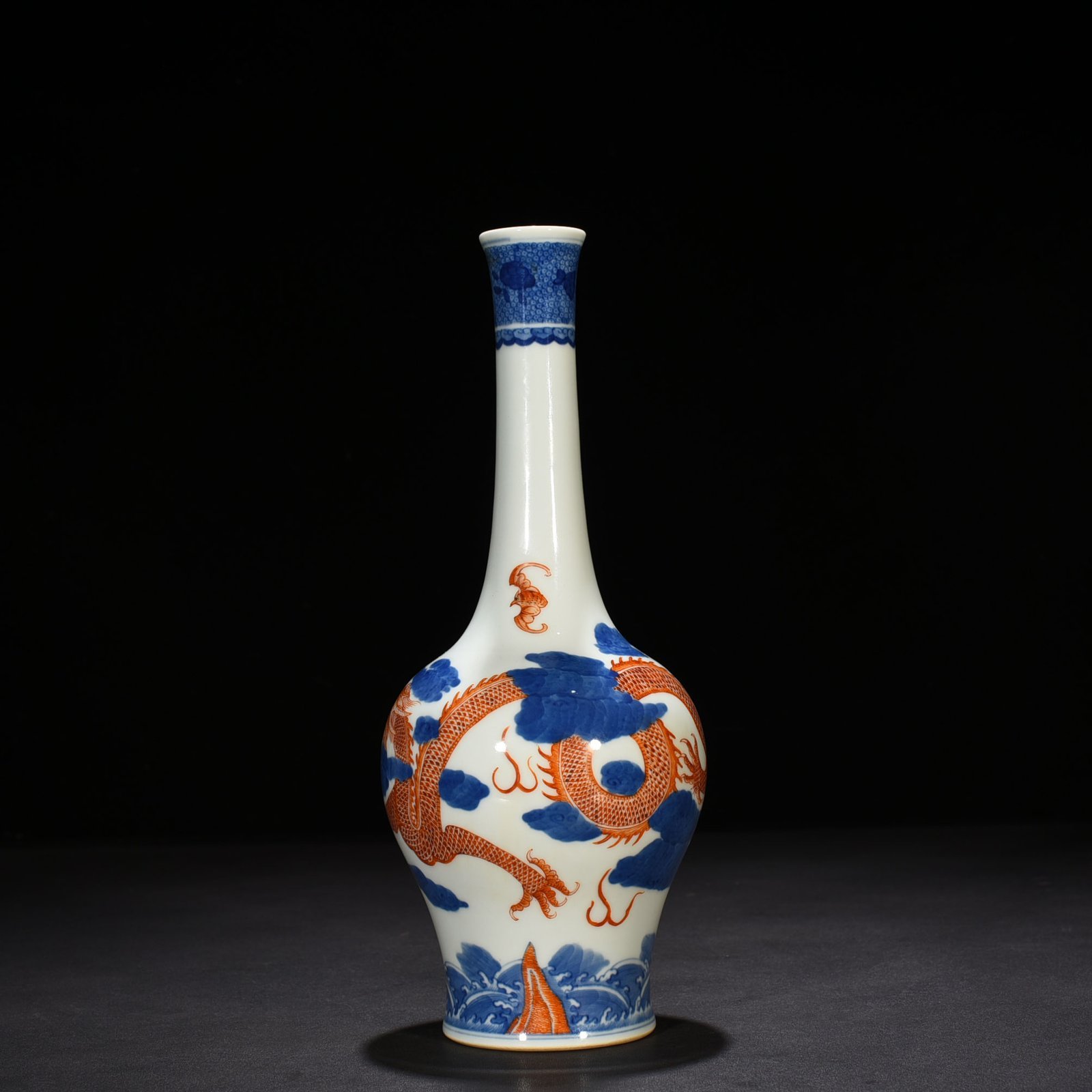 Qing Dynasty Qianlong blue and white alum red cloud and dragon pattern flask