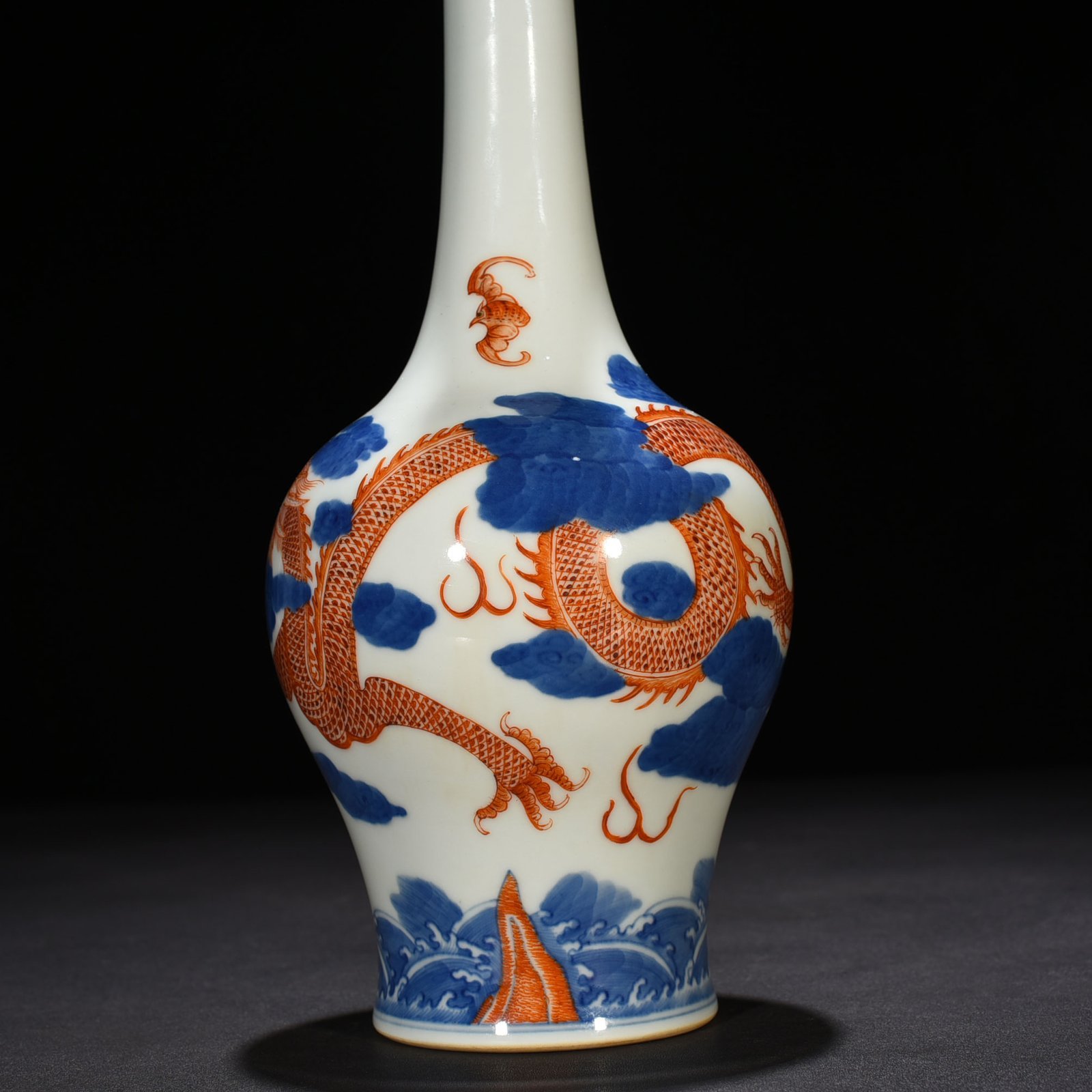 Qing Dynasty Qianlong blue and white alum red cloud and dragon pattern flask