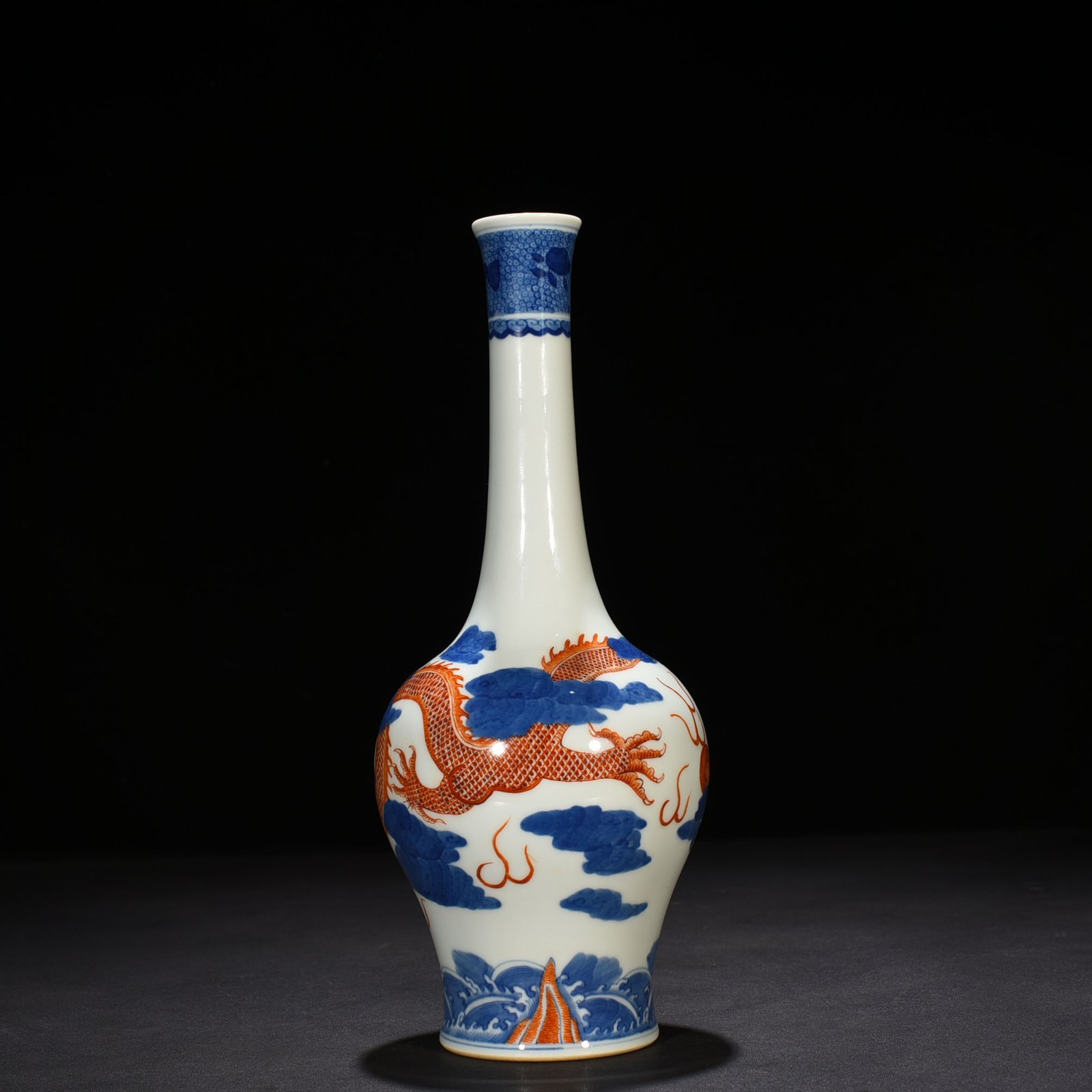 Qing Dynasty Qianlong blue and white alum red cloud and dragon pattern flask