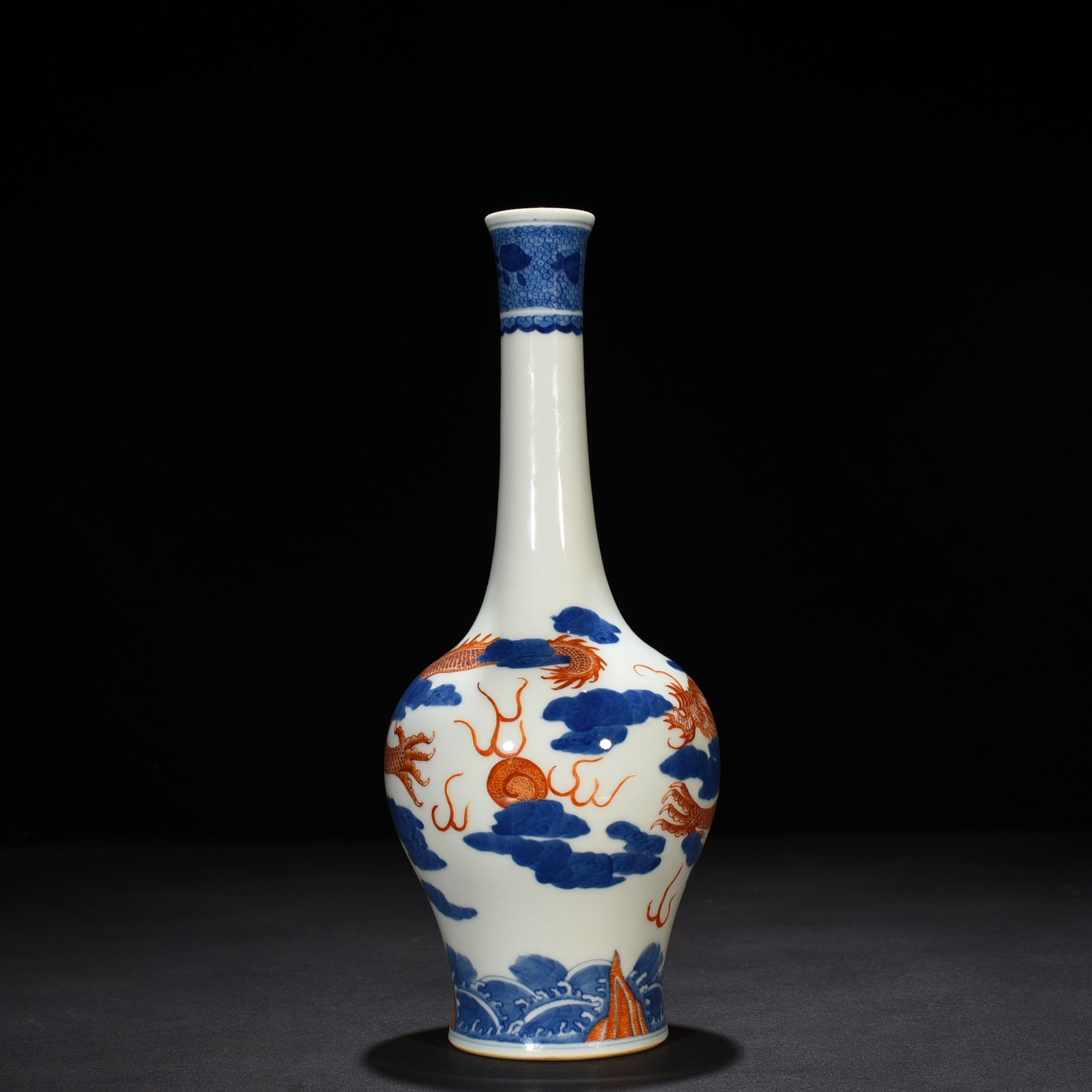 Qing Dynasty Qianlong blue and white alum red cloud and dragon pattern flask